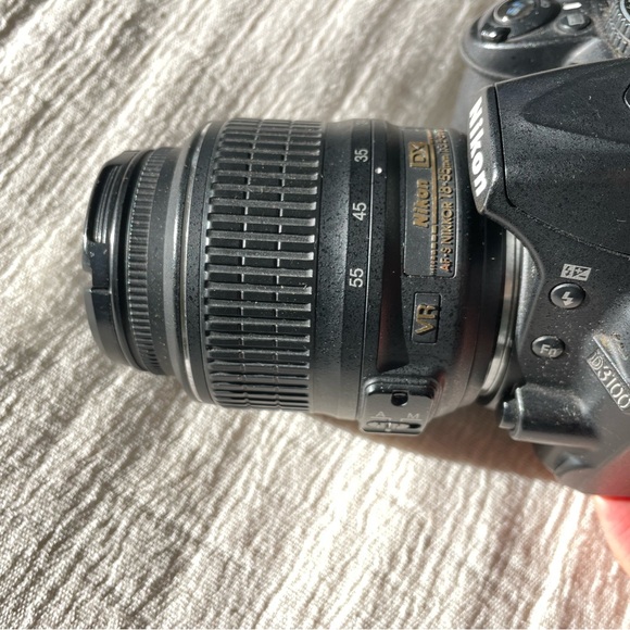 Nikon D3100 with camera bag, charger, lens, and tripod - Picture 4 of 9